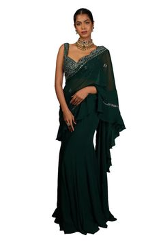 Emerald dark green pre-draped ruffle trim saree with embroidered border. Paired with a padded blouse with applique work, cutdana, sequins and beads embroidery. - Aza Fashions Applique Work, Ruffle Saree, Beads Embroidery, Padded Blouse, Drape Saree, Embroidered Border, Green Saree, Beaded Neckline, Embroidery Floral