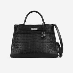 Elevate your style with timeless elegance embodied in the Hermès Kelly 35 handbag. Crafted meticulously from three distinct types of luxurious leather - Noir Matte Alligator, Clemence, and Box leather - this exquisite piece exudes sophistication and refinement.The Noir Matte Alligator exterior boasts a luxurious texture and a sleek, matte finish, adding a touch of opulence to any ensemble. Paired with Clemence and Box leather accents, the bag exudes a harmonious blend of classic and modern aesth Leather Accents, Dior Shoes, Logo Stamp, Exclusive Bag, Elevate Your Style, Chanel Handbags, Handbag Backpack, Alligator, Travel Bags