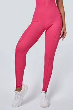 This jumpsuit enhances workouts with its open back for ventilation and stylish racerback detail. It features rear ruching for a flattering look, is designed to sculpt and lift the glutes, and includes removable pads for comfort and versatility. The half-zip closure is convenient for adjustable coverage, and its stretchy design contours to the body, allowing flexible movement. It's suitable for any occasion, blending fashion and function, ideal for active lifestyles. Fabric: Skin-friendly Super s Solid Activewear With Built-in Padding For Running, Solid Color Functional Yoga Pants For Training, Functional Solid Color Yoga Pants For Training, Functional Solid Yoga Pants For Training, Solid Activewear With Mesh Back For Workout, Full-length Activewear For Gym, Full Length Solid Color Activewear For Gym, Solid Color Full-length Gym Activewear, Full-length Gym Activewear