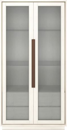 a white cabinet with two glass doors and a brown handle