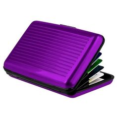 a purple case with four credit cards and a knife holder in the bottom one is open