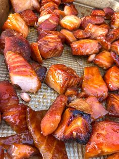 there are many bacon wrapped in strips on the tray and ready to be cooked together