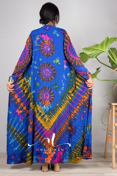 "Tie Dye Cardigan Kimono, Hippie Duster Vest with pockets, Festival Wrap Cape, Beach cover up PRODUCT SIZE : One Size Fits Most These are the exact measurements from the dress, measured whilst laying flat >> * Chest : 32\" up to 40\" * Shoulder to Shoulder : 14 \"  * Sleeve length from shoulder to hem : 21\" * Armhole : 16\" * Length : 48\" ( from shoulder to hem) NOTE :  * Model chest : 32\", waist : 24\" hips : 35\"  * Combined Height is 5\"6 > I'm 5\"2 (158cm) and I'm wearing 4\" heels in the Bohemian Long Sleeve Relaxed Fit Cover-up, Bohemian Long Sleeve Robe With Relaxed Fit, Bohemian Long Sleeve Relaxed Fit Robe, Oversized Long Sleeve Robe For Beach Cover-up, Casual Long Sleeve Kaftan One Size, Oversized Long Sleeve Cardigan For Beach Cover-up, Oversized Bohemian Cardigan With Pockets, Bohemian Oversized Cardigan With Pockets, Oversized Long Sleeve Cardigan For Beach