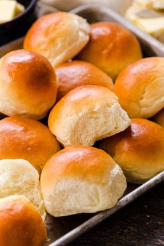 rolls in a pan with butter on the side