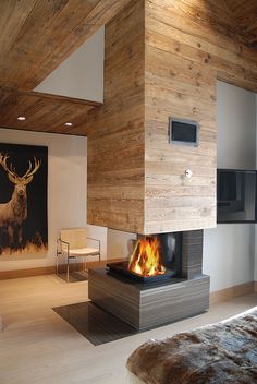 a living room with a fire place in it