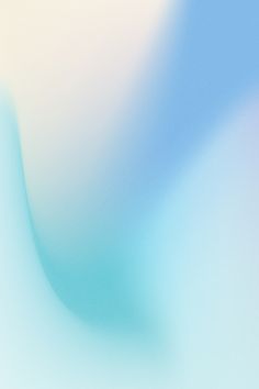 an abstract blue and white background with blur