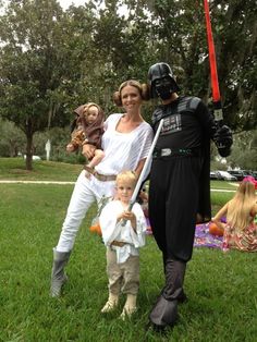 a family dressed up as darth vader and princess leisa