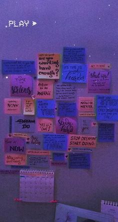 a bulletin board covered in sticky notes with words written on it and the word play