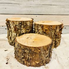 three pieces of wood sitting on top of a table