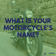 a motorcycle parked next to a stone wall with the words what is your motorcycle's name?