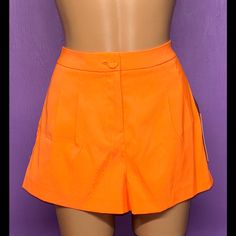 This Is A New, With Tags Forever 21 Exclusive Women's Shorts In A Size Medium. This Is In Excellent Condition! The Measurements Of The Waist Is 30", The Length Is 13", The Inseam Is 2" And The Rise Is 12". This Is A Bright Orange Color, Zips And Buttons In The Front, Front Is Pleated And Has Side Pockets. High-waisted Shorts For Night Out In Spring, Trendy Shorts For Night Out, Summer Shorts With Pockets For Night Out, Fitted Trendy Shorts With Short Inseam, Trendy Fitted Shorts With Short Inseam, Trendy Skort With Short Inseam, High-waisted Cotton Shorts For Night Out, Cotton High-waisted Shorts For Night Out, Trendy Summer Shorts For Night Out