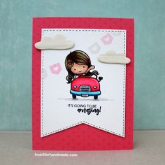 a handmade card with a girl driving a red car on it's side