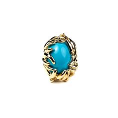 Product Description: This impeccably crafted polished gold branch ring featuring a turquoise cabochon center offers a fusion of luxe materials and harmonious design. With its ornamental branches in polished gold and a turquoise cabochon at its center, this ring will be an exquisite and addition to your collection. Dimensions: 1" x 1", Adjustable Sizes 5-8 Style Number: 7573RGT Gold Branches, Branch Ring, Cabochon Ring, Black Enamel, Clip On Earrings, Product Description, Turquoise, Gemstones, Crystals