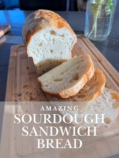 a loaf of sourdough sandwich on a cutting board with the words amazing sourdough sandwich bread