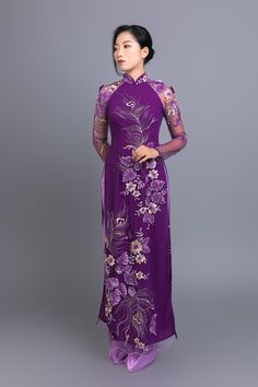 Custom made ao dai (Vietnamese traditional dress) in lace and purple chiffon (price includes pants worn underneath ao dai dress). This ao dai is spectacular yet very tasteful and elegant. After purchase we will send you a quick and simple form to guide you through taking the measurements we require for an amazing fit. Shipping details: Please allow up 4 weeks for custom making and shipping, once measurements are received. Colors: Please note; we make every effort to ensure our photos accurately Ao Dai Purple, Ao Dai Modern, Vietnamese Traditional Clothing, Ao Dai Wedding, Ao Dai Vietnamese, Vietnamese Wedding, Vietnamese Traditional Dress, Traditional Dress, Peacock Feather