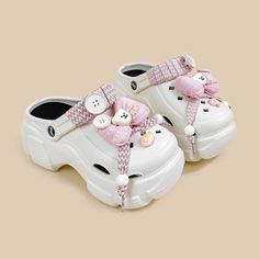 **These shoes are a LIMITED EDITION. Once sold out, they will NOT be restocked!** Features: Get Summer ready with our Baby Pink Bear Chunky Slip on Outdoor Clogs! Made with ultra thick and comfy EVA foam to give you the softest steps. Comes with the CUTEST detachable charms, so you can dress up or dress down these clogs to whatever your feet desire. Whether you're out running errands or just hanging out with friends, our shoes will help you look and feel your best. Upgrade your shoe game today! White Eva Clogs With Round Toe, White Round Toe Eva Clogs, Non-slip Synthetic Platform Slippers With Closed Toe, Non-slip Synthetic Closed Toe Platform Slippers, White Casual Eva Clogs, White Non-slip Platform Slippers For Spring, Trendy Non-slip Clogs With Round Toe, Platform Slippers With Cushioned Footbed And Round Toe, Trendy White Platform Slippers With Round Toe