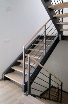 the stairs are made of metal and wood