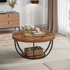 a living room with a coffee table and two baskets on the floor in front of it