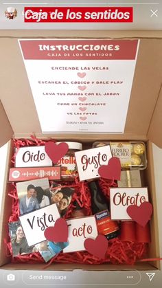 an open box filled with valentine's day cards and other personalized items in spanish