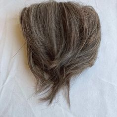 "The color matches my hair beautifully. I am trying to grow my hair out. I make a little short pony and attach the scrunchy around the pony using hair pins. Then I turn the hairs under to make a neater bun and pin it. It stays in place al..." - Terri B. Blonde With Grey Hair, Blonde With Grey, Hair Shade, Ash Brown Hair Color, Ash Hair Color, Bun Hair Piece, Extension Hair