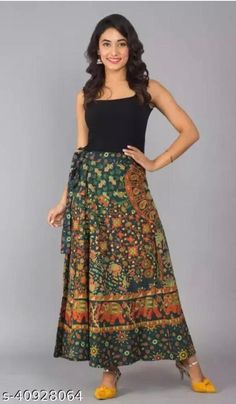 RR impex provides you this regular fit and long cotton skirt to showcase your fashion. This skirt gives you utmost comfort all day long and is easy to maintain. You can pair this skirt with tank top or short kurta and footwear of your choice. Note: - This skirt is free size it can be worn from 26 to 44 waist. Skirt With Tank Top, Long Cotton Skirt, Short Kurta, Multicolor Skirt, Cotton Skirt, Wrap Around, Free Size, Favorite Outfit, Art Collection