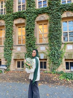 hijabi wearing green modal scarf cream rory gilmore sweater black straight jeans chelsea boots holding pastel flower bouquet downtown princeton vanilla girl aesthetic clean girl muslim minimalist ootd birthday brunch Green Modest Outfit, Same Time Next Year, Green Hijab, Emerald Green Inspiration