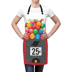 a woman wearing an apron with balloons in the front and number twenty five on it