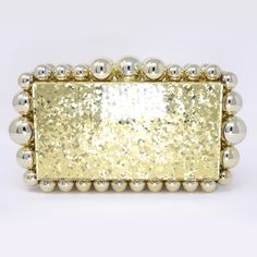 New to our Millennium collection, This beautiful romantic Gold Floral Acrylic Bling bridal clutch bag is made of very fine quality of Acrylic, metal, Rhinestone and it comes with a 45 inch long Detachable chain for your Big day! Measurements of the bag is length 9 inches, height 5 inches, width 2.5 inches  ► ABOUT YOUR ORDER * All items are neatly packaged in our beautiful jewelry boxes and elegant organza bags. * All items are 100% gift-ready. * Each order comes with a personalized handwritten card and a branded Millennium Bride jewelry cloth. * Each order comes with a free gift. ► PERSONALIZTION * If your order is a gift, you may contact us with the recipient's name or a message, and we'll print a personalized card that will be elegantly packaged with your order. We'll also personalize t Glamorous Gold Clutch With Pearl Handle, Gold Clutch With Pearl Handle As Gift, Gold Clutch With Pearl Handle For Wedding, Rectangular Clutch With Pearl Handle For Wedding Guest, Champagne Rectangular Clutch For Wedding, Glamorous Rectangular Clutch For Wedding Guest, Wedding Clutch Bridal, Bridal Clutch Bag, Bridal Earrings Studs