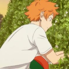 an anime character with orange hair and white shirt looking at something in front of him