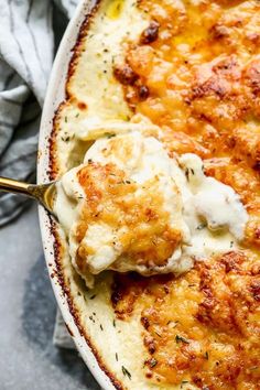 a casserole dish with chicken and cream sauce