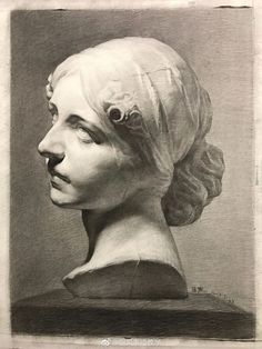 a black and white drawing of a woman's head