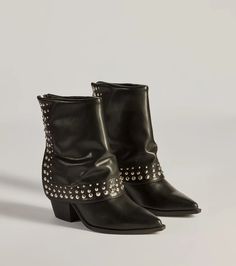 These faux leather booties feature an above-the-ankle fold-over design with a chic studded embellished trim, a pointed toe, a back zipper closure for effortless styling, and a stacked block heel. Pair with a mini dress and faux leather jacket!Fit & FeaturesStacked block heelFaux leather materialAbove-the-ankle fold-over designStudded embellished trimPointed toeBack zipper closureRuns true to size Orange Homecoming Dresses, Purple Homecoming Dress, Homecoming Shoes, Backless Dress Short, Green Homecoming Dresses, Black Tie Wedding Guests, Red Homecoming Dresses, Blue Homecoming Dresses, Formal Dresses With Sleeves