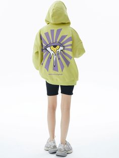 Make a bold statement with our Lime Green Graphic Zip Hoodie. This eye-catching sweatshirt features a vibrant lime green base with contrasting purple text across the chest. The playful typography design includes quirky eye graphics, adding a unique touch. With a comfortable fit, full-zip front, and kangaroo pockets, this hoodie combines style and practicality. Perfect for those who love standout streetwear with a fun twist, it's ideal for casual outings or lounging in style. The hoodie's bright Trendy Oversized Yellow Hoodie, Green Hoodie With Screen Print For Streetwear, Trendy Purple Sweatshirt With Graphic Print, Green Hooded Sweatshirt With Logo Print, Green Cotton Hoodie With Graphic Print, Green Screen Print Sweatshirt For Streetwear, Green Letter Print Hoodie, Fun Hoodie With Letter Print For Streetwear, Green Hoodie Sweatshirt With Letter Print