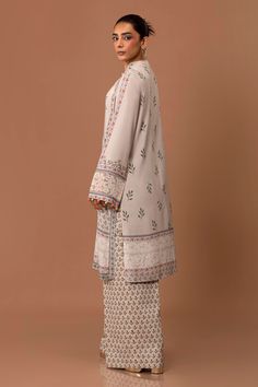 Brand: Sana SafinazProduct Code: H243-008B-2ACCollection: Mahay by Sana Safinaz Unstitched Winter CollectionFabric: Linen DESIGN DETAILS: Digital Printed Shirt Front On Linen 1.15 Meters Digital Printed Shirt Back On Linen 1.15 Meters Digital Printed Sleeves On Linen 0.65 Meters Embroidered Patti On Organza 1 Meter Rotary Printed Cambric Pants 1.75 Meters DISCLAIMER:* Lining, Laces, and Tassels are not included in unstitched variants.* Embellishment items in stitched outfits are subject to market availability.* Product color may vary due to photographic lighting or your device settings. CARE INSTRUCTIONS: Extra Fabric Has Been Used For Shoot Original Color May Vary Slightly From The Picture Dry Clean Recommended Iron The Clothes At Moderate Temperature Do Not Use Bleach, Or Stain Removing Chanderi Set With Printed Motifs And Long Sleeves, Bohemian Straight Kurta Set With Resham Embroidery, Chanderi Palazzo Set With Chikankari Embroidery Long Sleeve, Chanderi Palazzo Set With Chikankari Embroidery, Chikankari Embroidered Chanderi Palazzo Set With Long Sleeves, Bohemian Sets With Resham Embroidery And Straight Kurta, Designer Long Sleeve Sharara In Mulmul, Silk Palazzo Set With Chikankari Embroidery And Long Sleeves, Silk Long Sleeve Palazzo Set With Chikankari Embroidery