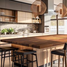 an island in the middle of a kitchen with bar stools and wooden counter tops