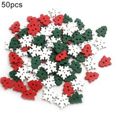 some red and green snowflakes are in a pile