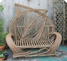 a wicker chair sitting in front of a building