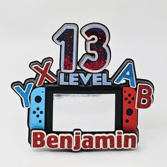 an image of a birthday card with the number thirteen and gameboy design on it