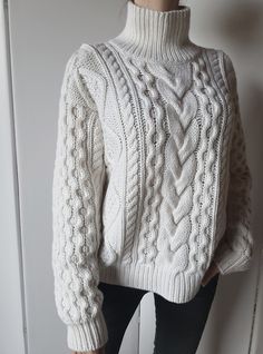 Amazing cable knit sweater. Very cozy, soft and warm. 100% handmade. Perfect quality! The composition is 100% cashmere. Color: coco white If you want any colour, please, let me know Size: oversize Sweater width 54 cm / 21.2 in Sweater length 62 cm / 24.4 in I'll make the size according to your measurements also I'll knit your sweater 14 days along EMS delivery 2 weeks to any country FREE worldwide shipping If you have any questions, please send me message 🤗 Luxury Knitted Sweater One Size, Luxury Knitted Sweater For Winter, Luxury Knitted Winter Sweater, Luxury Cable Knit Turtleneck For Fall, Luxury Knit Winter Sweater, Cheap Cozy Cable Knit Tops, Oversized Cable Knit Sweater With Long Sleeves, Oversized Cable Knit Cashmere Sweater, Oversized Cotton Cable Knit Sweater