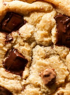 a close up view of a cookie with chocolate on top