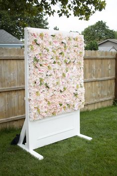 a large flower wall in the backyard