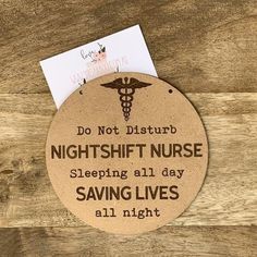 a sign that says, do not disturb nightshirt nurse sleeping all day saving lives all night