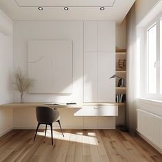 an empty room with a desk and chair in the corner, next to a window