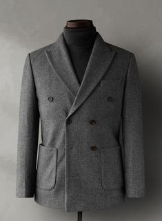 Create your own ideal style, making it unique for yourself and identifiable for others with our Gray Heavy Tweed Jacket. Crafted from pure wool, the gray shade has a very friendly vibe and is a definite keeper for all your important occasions. 
 
Look Includes   Gray Heavy Tweed Fabric  Double Breasted Jacket Style   Wide Peak Lapel (3.75")    Faux Horn Brown  Buttons  Double Vent  Four Cuff Buttons    Click 'Customize Now' to modify the look if needed.  
 
Lining: Viscose; Dry Clean. Tailored Gray Wool Coat, Tailored Gray Wool Coat For Business, Business Casual Wool Tweed Jacket With Double Button, Wool Tweed Jacket With Double Button For Business Casual, Gray Single Breasted Semi-formal Outerwear, Gray Single Breasted Outerwear For Semi-formal Occasions, Gray Winter Blazer For Business, Gray Business Blazer For Winter, Gray Winter Business Blazer