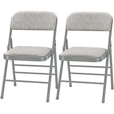 two gray folding chairs sitting next to each other