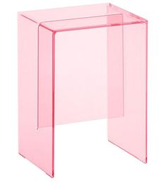 a pink plastic table on a white background