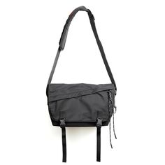 Looking for a stylish and practical crossbody bag? Look no further than the Crossbody Techwear Sling Bag! This casual bag is perfect for everyday use, with a spacious interior and plenty of pockets to keep your belongings organized. made from durable waterproof oxford fabric, it's perfect for those days when you're on the go and need your hands free. The comfortable strap means you can wear it over your shoulder or across your body, making it perfect for carrying all your essentials. So don't wa Large Capacity Nylon Laptop Shoulder Bag, Functional Nylon Shoulder Bag With Multiple Pockets, Functional Nylon Crossbody Backpack, Techwear Travel Bag With Pockets, Nylon Techwear School Bags, School Techwear Nylon Bags, Techwear Style Nylon School Bag, Techwear Nylon Shoulder Bag For Outdoor, Functional Everyday Saddle Shoulder Bag