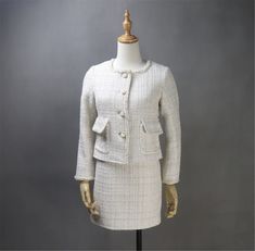 Introducing our Women's Custom Made Beige Checked Pattern Tweed Blazer Coat and Skirt Suit - a timeless ensemble crafted for weddings, speech days, graduations, and the perfect personalized gift. 🌟 Tailored to Perfection: Each piece is meticulously crafted to your measurements, ensuring a tailored fit that accentuates your elegance. Revel in the luxury of a personalized suit that reflects your individual style. 🌸 Classic Checked Pattern: The beige checked tweed pattern adds a touch of classic charm to this ensemble, creating a look that is both stylish and sophisticated. Embrace timeless elegance for special occasions. 👚 Versatile Blazer Coat: The blazer coat serves as a versatile piece that can be dressed up or down. Whether you're attending a wedding, a speech day, or a graduation cer Tweed Skirt Suit, Suit For Wedding, Womens Skirt Suits, Coat Skirt, Tweed Pattern, Wedding Speech, Service Women, Tweed Suits, Tweed Skirt