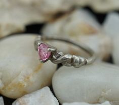 This is the perfect option for those who like cool, unique jewelry and the luxury, shine of silver, pink. This ring is well made, cute and/or elegant in design, and very desirable. The ring is decorated with cz on the top. The shape of the top is triangle. ♥ There is a hallmark: Sterling. 925 ♥The size of the ring is 3 1/4. This piece is from estate where all the jewelry was from USSR. It is very old and collectible piece. This item is pre-owned vintage and may show some wear commensurate with i Handmade Sterling Silver Pink Rings, Nickel Free Pink Promise Ring, Handmade Pink Sterling Silver Rings, Silver Pink Sapphire Birthstone Jewelry, Nickel-free Pink Rings For Anniversary, Nickel-free Pink Rings For Gifts, Silver Triangle Rings For Gifts, Silver Triangle Rings For Gift, Silver Trillion-cut Solitaire Jewelry