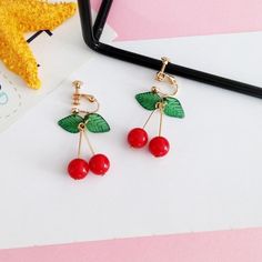 Love Red Cherry Earrings? "The most precious gift we can offer anyone is our attention. When mindfulness embraces those we love, they will bloom like red cherry flowers." ~ Nhat Hanh. Get these beautiful Red Cherry Earrings and live the moments. Earring Type: Drop Earrings Fine or Fashion: Fashion Item Type: Earrings Style: Trendy Metals Type: Zinc Alloy Shape\pattern: Heart Material: Metal Gender: Women Brand Name: XIALUOKE is_customized: Yes Model Number: 888 Golden: Feather Anniversary, Gift, Cherry Drop Earrings, Sweet Earrings, Geometric Type, Cherry Earrings, Kawaii Jewelry, Golden Earrings, Gold Bracelet For Women, Red Cherry, Couple Jewelry